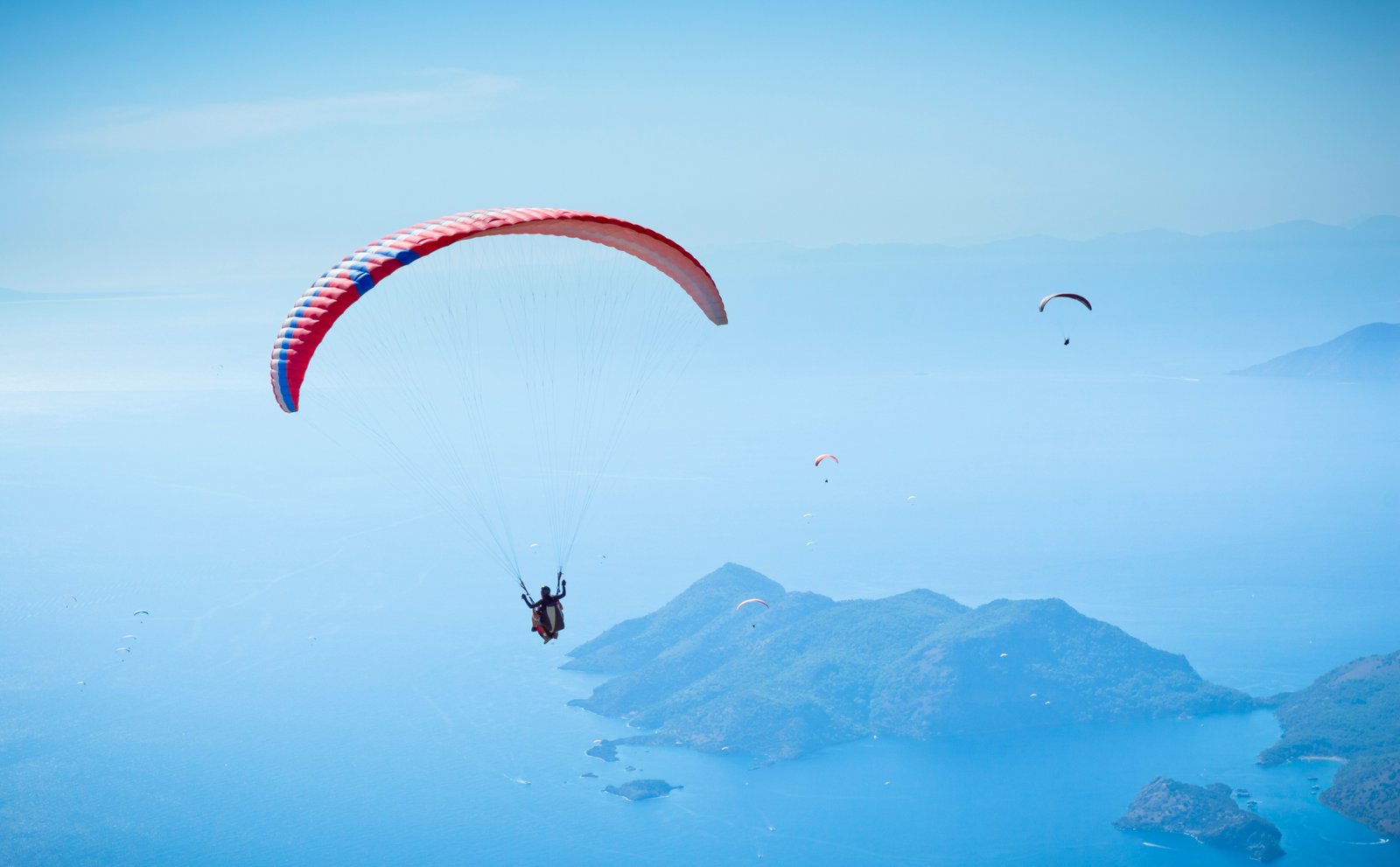 Paragliders above the blue coastline of Ölüdeniz, Fethiye